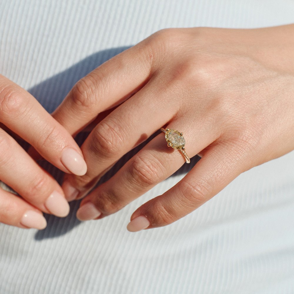 A picture of a gemstone solitaire engagement ring.