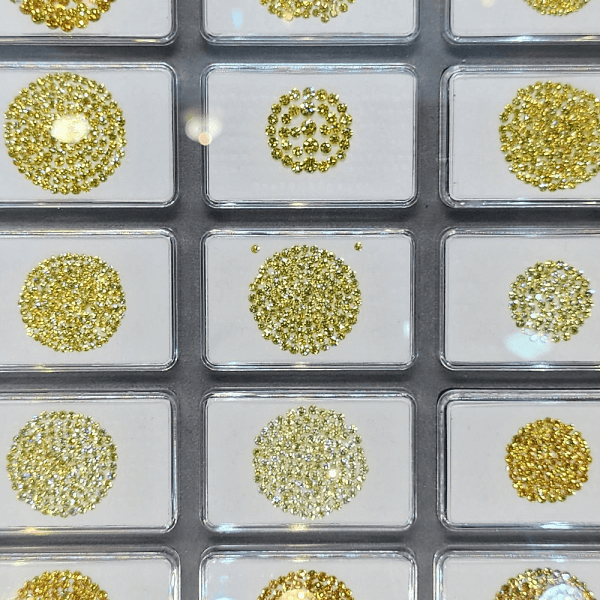 An image of various citrine gemstones that symbolize joy, abundance, and energy.