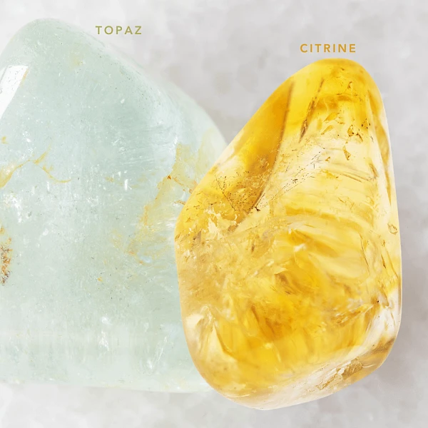 Image of the gemstones topaz and citrine, the November birthstones.