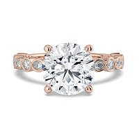 Cara 4 Claws with Oval and Round Diamonds on Band