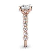 Cara 4 Claws with Oval and Round Diamonds on Band