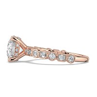 Cara 4 Claws with Emerald and Round Diamonds on Band