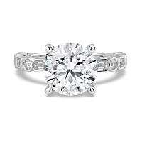 Cara 4 Claws with Emerald and Round Diamonds on Band