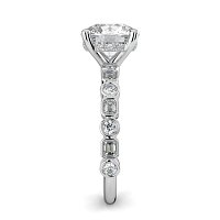 Cara 4 Claws with Emerald and Round Diamonds on Band