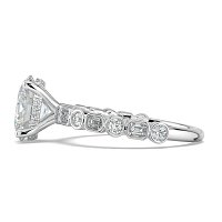 Cara 4 Claws with Emerald and Round Diamonds on Band