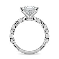 Cara 4 Claws with Emerald and Round Diamonds on Band