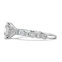 Cara 4 Claws with Emerald and Round Diamonds on Band