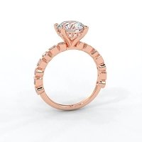Cara 4 Claws with Emerald and Round Diamonds on Band